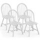 Set of 4 white vintage Windsor wood chairs with spindle backs, ergonomic seats for dining room comfort and style.